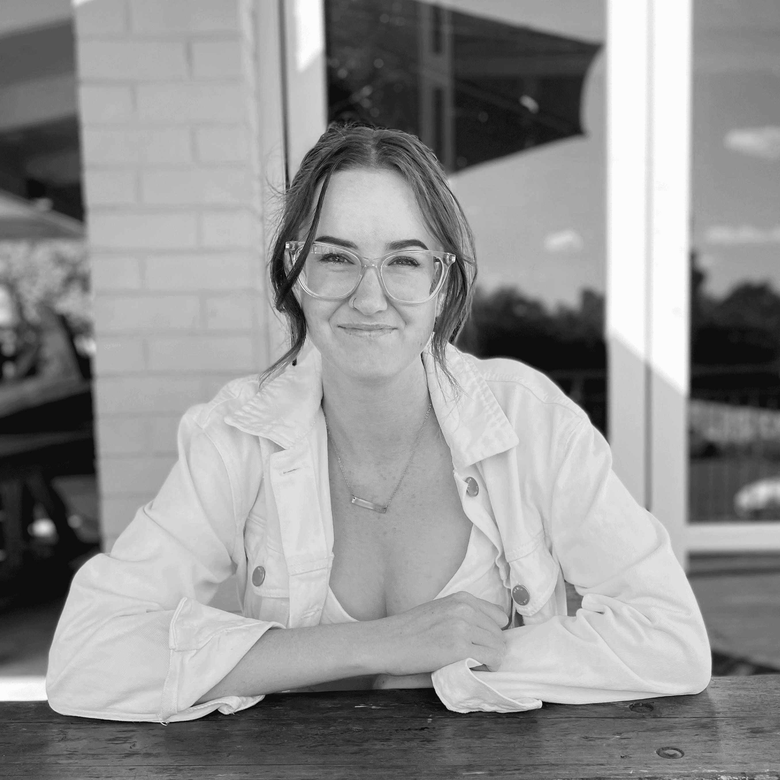 Ava sitting at a table