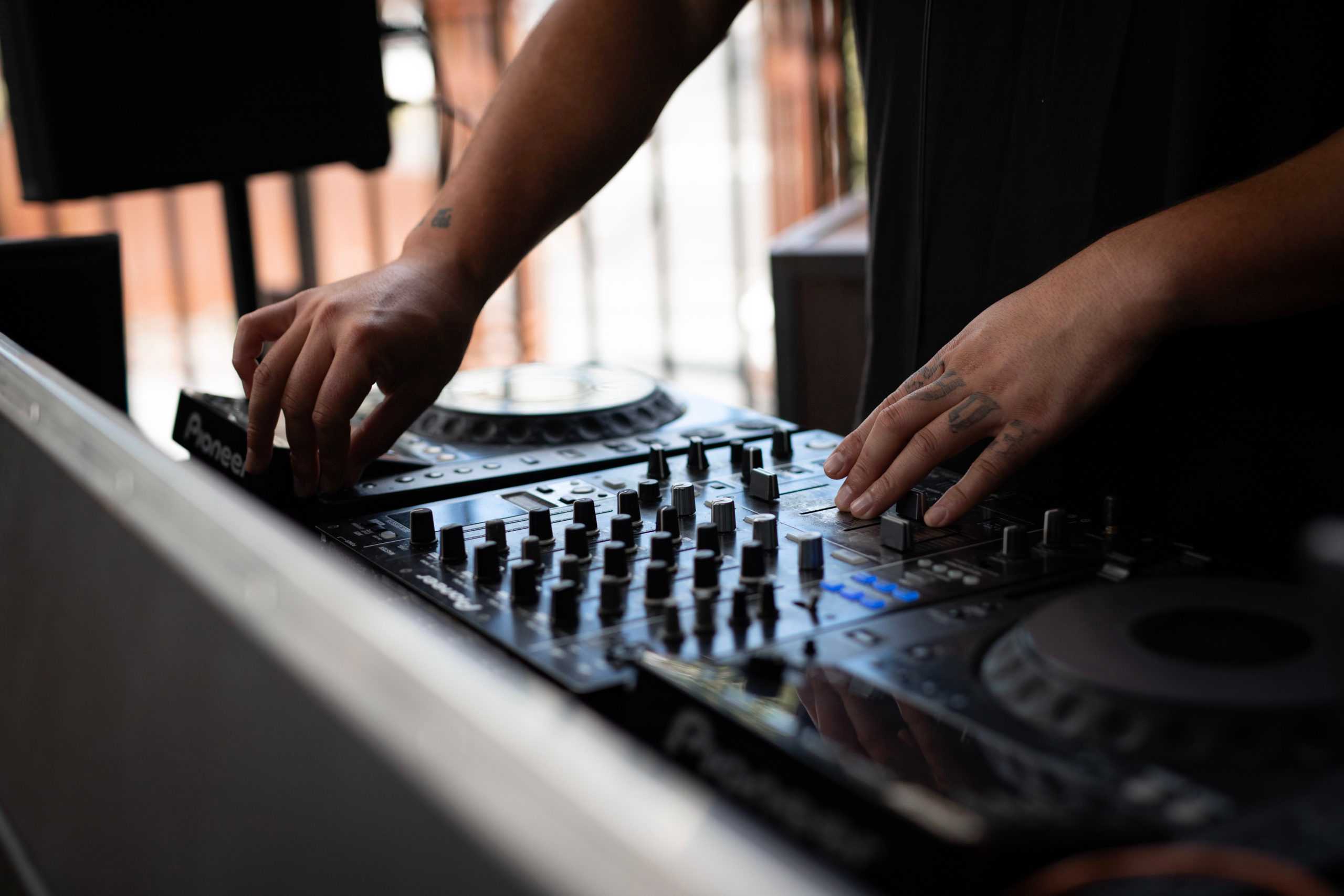 Request Line DJ working a set on the CDJ decks